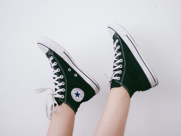 black and black and white Converse All Star high-top sneakers