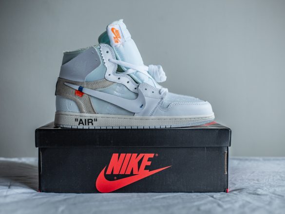 a pair of sneakers sitting on top of a box